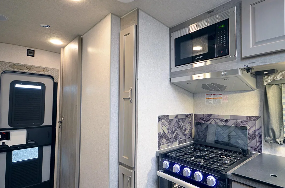 Norcold absorption fridge service on a visiting Class C parked near Cameron Park Zoo in Waco