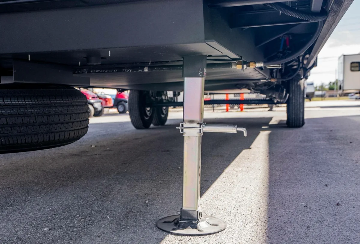 HWH hydraulic-leveling solenoid service on a Class A motorhome at Palm Beach Motorcoach Resort