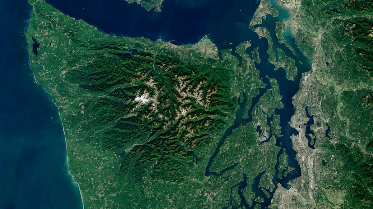Olympic Peninsula coastline and Olympic Mountain backdrop in northwestern Washington